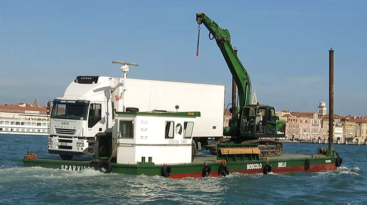 barge-carrying-truck-crane